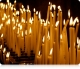 Что означает свечка, которую верующие зажигают перед священным образом в храме?